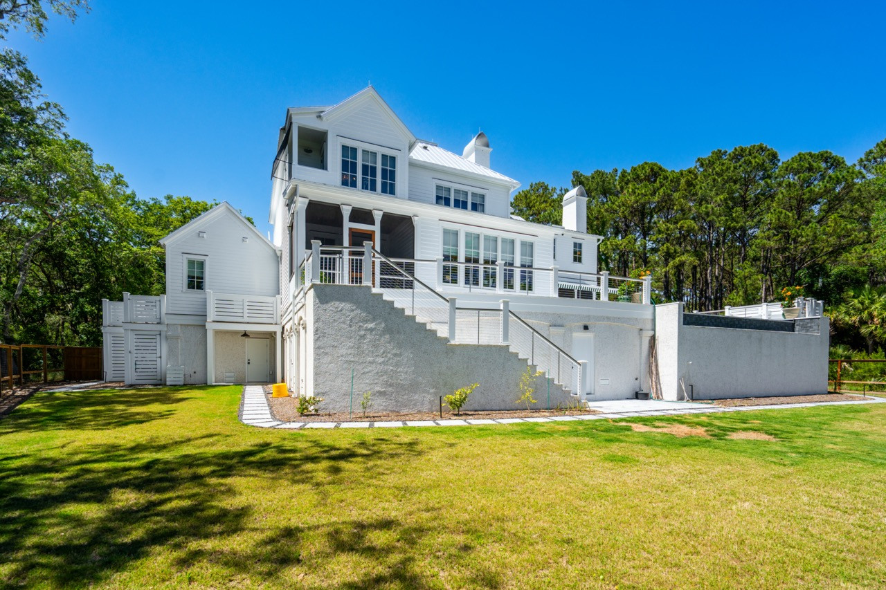 LongmarshRd-Sea-Island-Builders-Sewee-Magic-Custom-Home-Build--rear-elevation-infiniti-pool