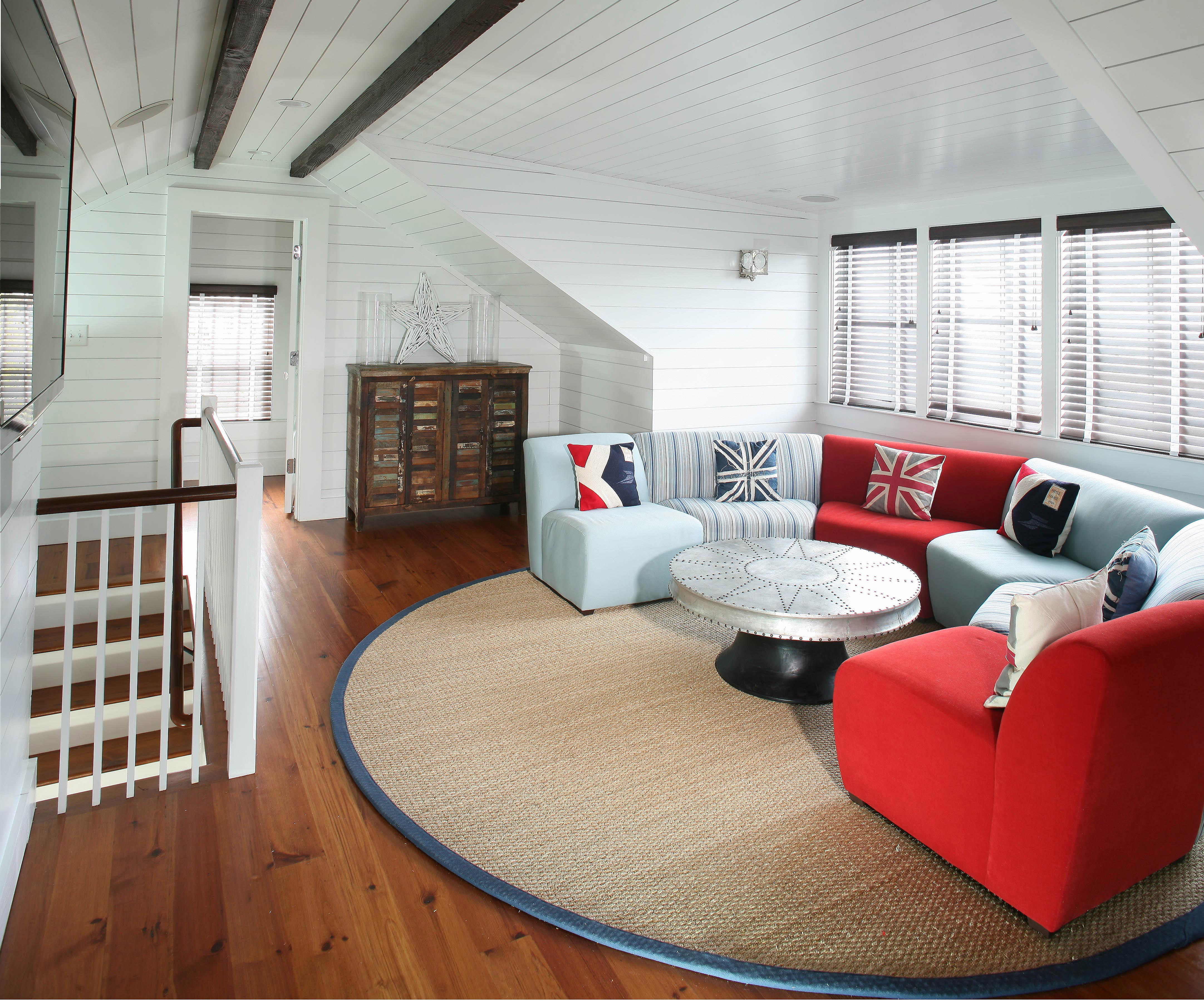 We turned an unfinished attic into an airy living room as part of this Sullivan's Island renovation project.